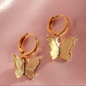 Gold buttery fly huggies earring